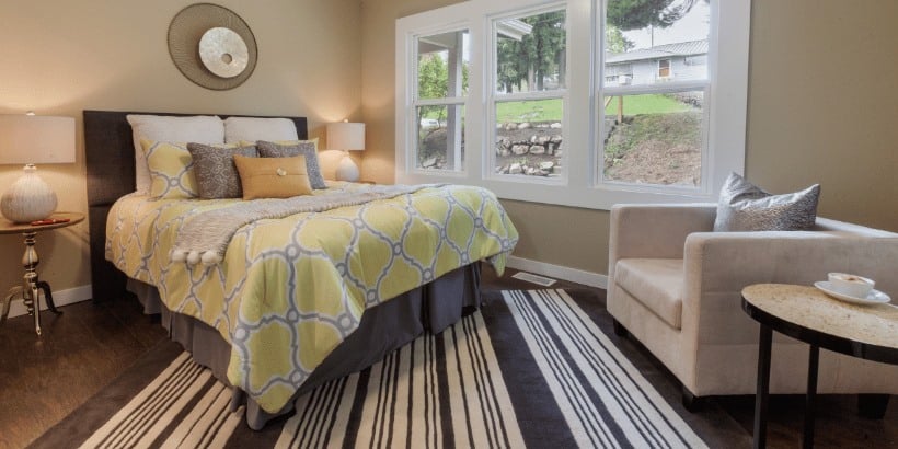 A bedroom that has been staged for a home sale