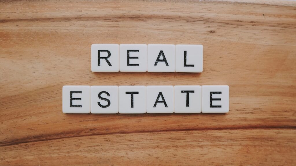 Professional real estate team collaborating in an office.